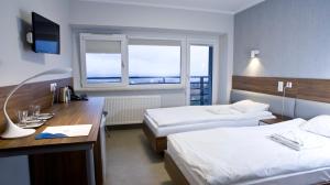 Posteľ alebo postele v izbe v ubytovaní Sanatorium Równica + 37 fotografií