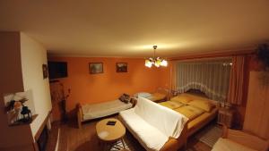Кровать или кровати в номере Privát u Zdenky