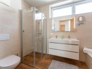 a bathroom with a shower and a toilet and a sink at Pabstin in Sankt Lambrecht +68 photos