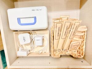 a box filled with different types of electrical equipment at Fine On Stay Jeonpo in Busan