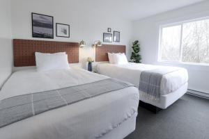 Voodi või voodid majutusasutuse The Moosetide Hotel toas