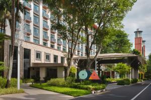 a rendering of a hotel with a building at Resorts World Sentosa - Hotel Ora in Singapore