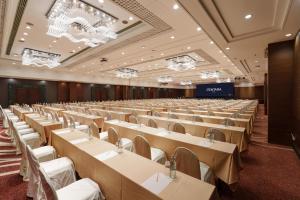 a large banquet hall with tables and chairs at Centara Udon in Udon Thani +110 photos