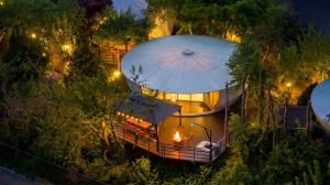 an image of a round house with an umbrella at Gapyeong Pine4rest Glamping in Gapyeong