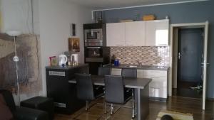 A kitchen or kitchenette at Apartmán Terchová