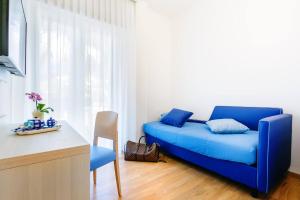 Posezení v ubytování Aequa Hotel