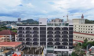 a view of a building in a city at SleepRest Azure Suites in Bagam