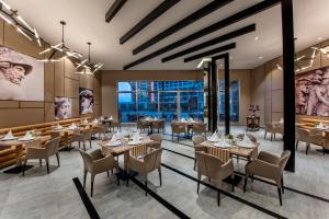 A restaurant or other place to eat at Delphin BE Grand Resort