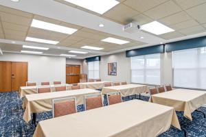 a conference room with white tables and chairs at Hampton Inn Duluth-Canal Park in Duluth +63 photos