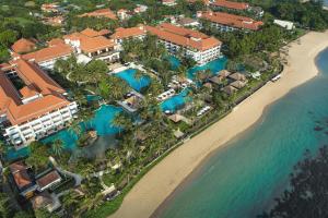 an aerial view of the resort and the beach at Conrad Bali in Nusa Dua