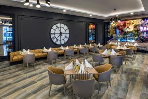 A restaurant or other place to eat at Delphin BE Grand Resort