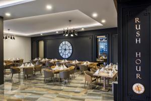 A restaurant or other place to eat at Delphin BE Grand Resort