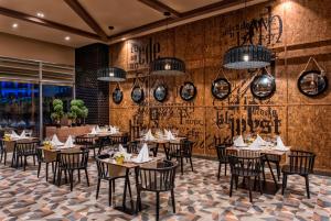 A restaurant or other place to eat at Delphin BE Grand Resort