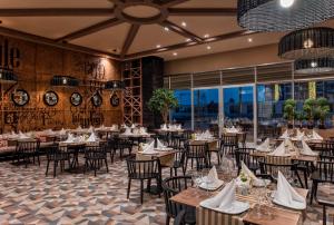 A restaurant or other place to eat at Delphin BE Grand Resort