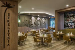 A restaurant or other place to eat at Delphin BE Grand Resort