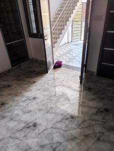 an empty room with a marble floor and stairs at Bari Mata home ste in Lakāwās