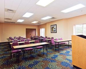 a classroom with tables and chairs in a room at Quality Inn Brunswick Cleveland South in Brunswick