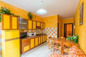 Кухня или кухненски бокс в Residence Bussola