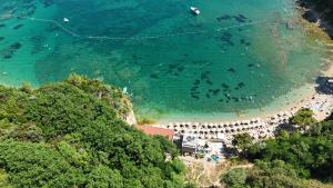 an aerial view of a beach with a crowd of people at Panoramic Sea View in Budva +2 photos