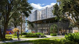 a person walking in a park in front of a building at Sky Luxury Residence, 12th Floor, Panoramic in Guadalajara