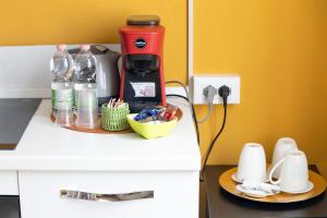 a coffee maker sitting on top of a counter at La Casa di Dadà in Avezzano