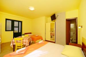 Posteľ alebo postele v izbe v ubytovaní Apartments Joško