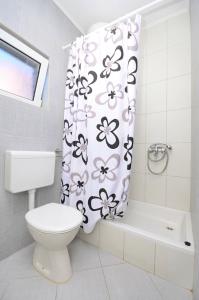 Kúpeľňa v ubytovaní Apartments Joško