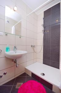 Kúpeľňa v ubytovaní Apartments Joško