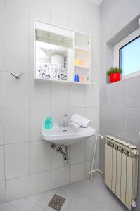 Kúpeľňa v ubytovaní Apartments Joško