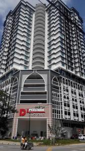 a large building with two large tall buildings at SAS D'PERDANA Apartment in Kota Bharu