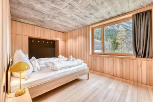 En eller flere senge i et værelse på Appartementhaus Studa 29