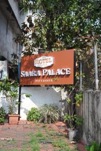 a sign for a hotel saa palace at Nova Saara Palace in Kannur +15 photos