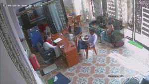 a group of people sitting at a table in an office at Pallavi girl hostel in Laheria Sarāi