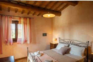 a bedroom with a bed and a window at Casalantico in Corinaldo +59 photos