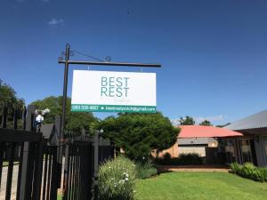 a sign that reads best rest in a yard at Cosy - Best Rest Potch in Potchefstroom +2 photos