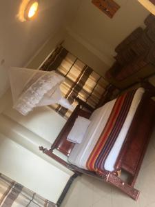 an overhead view of a bed in a room at Acactus Hotel in Kampala