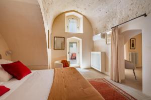 a bedroom with a bed in a room at Palazzo Saetta in Nardò +41 photos