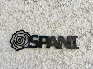 a sign for a car with a flower on it at Casavacanze Salento Spani in Veglie +6 photos