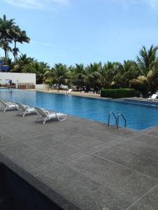 Bazén v ubytování Resort Playa Azul Departamentos frente al mar nebo v jeho okolí