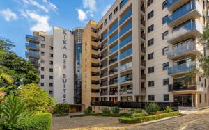 an apartment building in the city of sydney at Kika Des Hotel Suites - Serviced Apartments, Westland, Nairobi in Nairobi