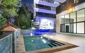 an image of a swimming pool in a house at Kika Des Hotel Suites - Serviced Apartments, Westland, Nairobi in Nairobi