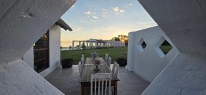 a view of a patio with a table and chairs at Mooring Manor Chalet in Vaal Marina