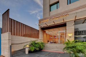 a building with the entrance to a building at Click collection Lucknow in Lucknow