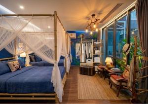 a bedroom with a bed with a canopy at Nego Home Ancient Inn in Bangkok +57 photos