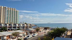 a view of the ocean from a building at villaislandia in Oropesa del Mar