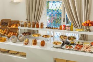 a table with many different types of food on it at Dar Said in Sidi Bou Saïd