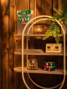 a wooden wall with a shelf with a glass at Chez Cathy in Villandraut +24 photos