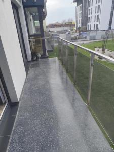 a walkway on the side of a building at Apartament Isabell in Busko-Zdrój