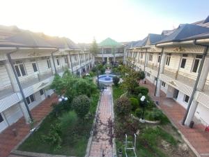 an aerial view of a courtyard in a building at Shodlik Hostel in Andizhan