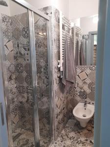 a bathroom with a shower and a toilet at Home Lotus Flower in Labin +67 photos